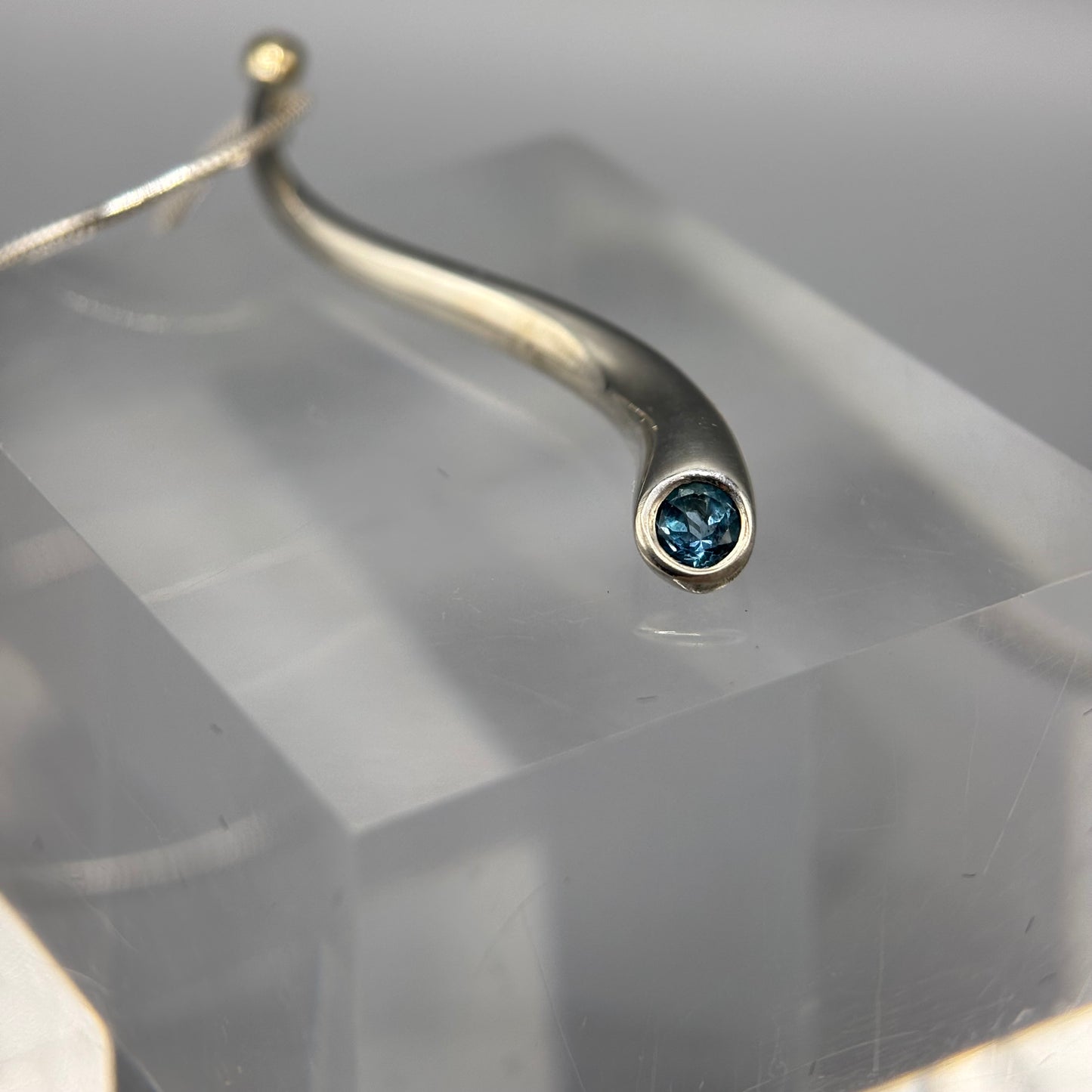 Paul Finch - Curving Silver Pendant with 18ct Gold Bead