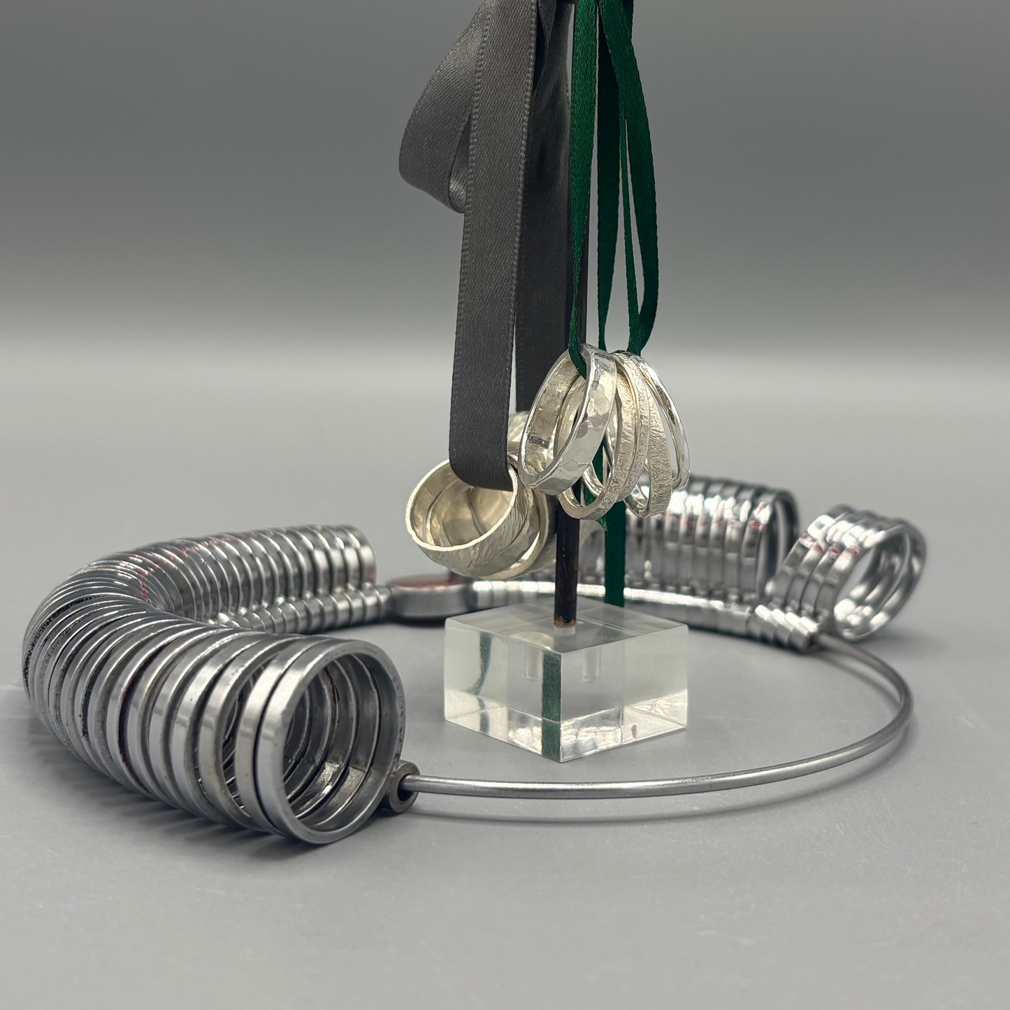 Silver rings and ring sizer