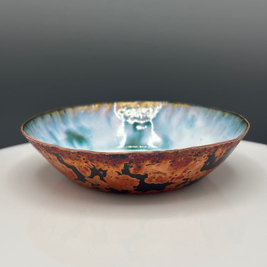 Cruan Marino Small Enamelled Copper Bowl Soft White II, full view showing raw copper exterior and oceanic blue interior