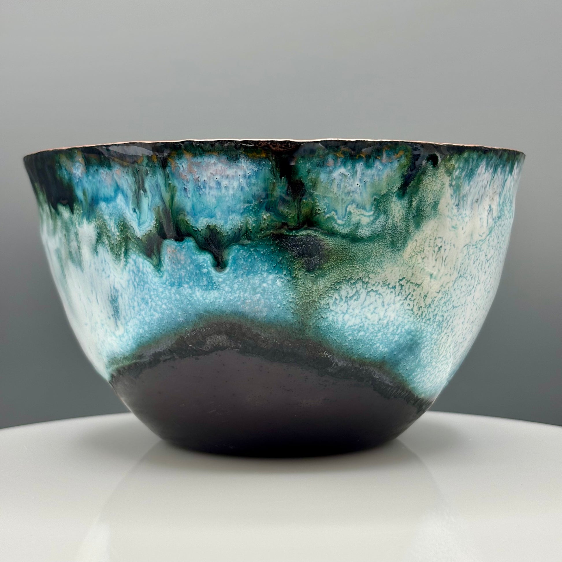 Cruan Marino Large Enamelled Copper Bowl, exterior view showing teal and black enamel