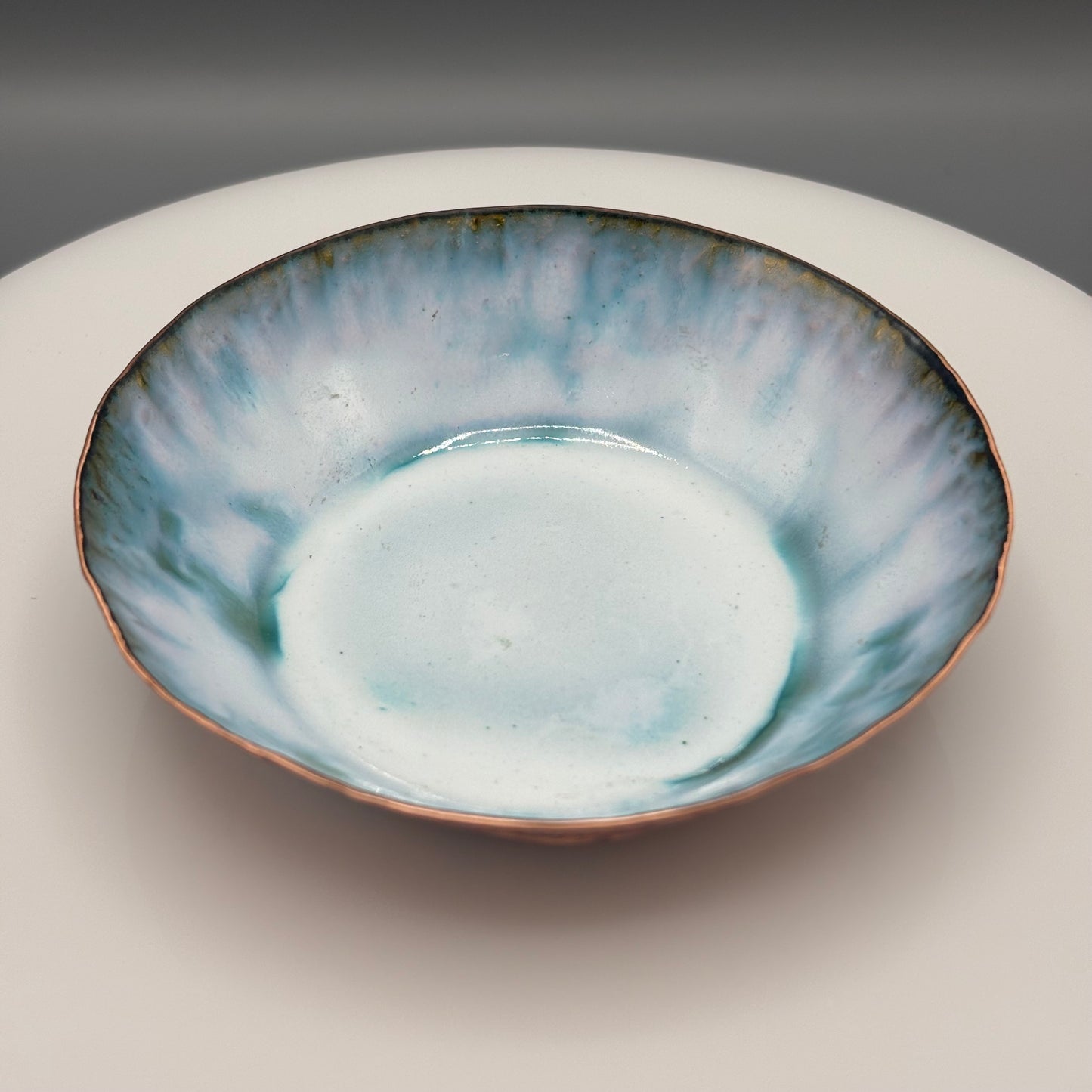 Cruan Marino Small Enamelled Copper Bowl Soft White II, top-down view showing pale blue and white interior