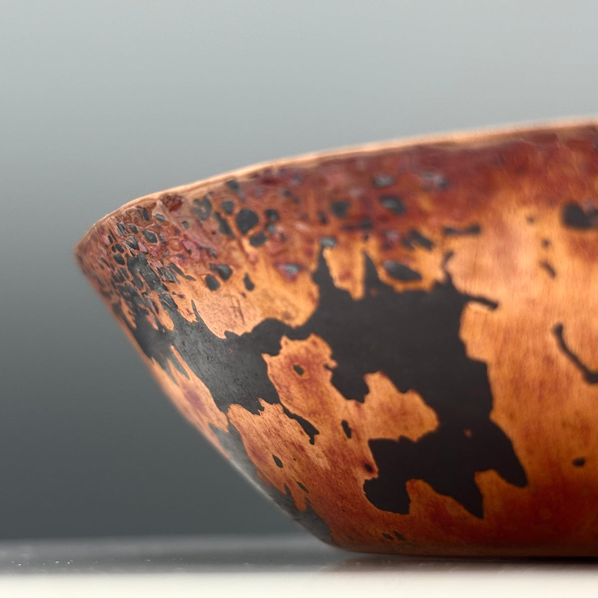 Cruan Marino Small Enamelled Copper Bowl Soft White II, close-up of textured copper exterior and rim