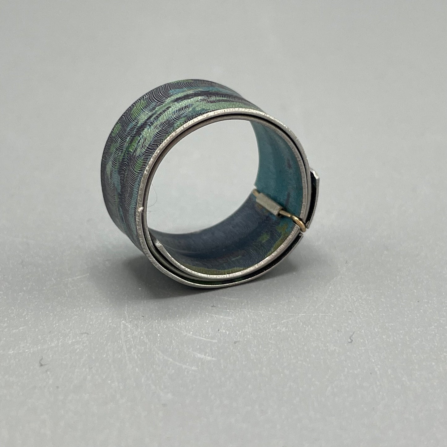 Jane Adam Anodised Aluminium Spiral Ring with 9ct Gold Accent