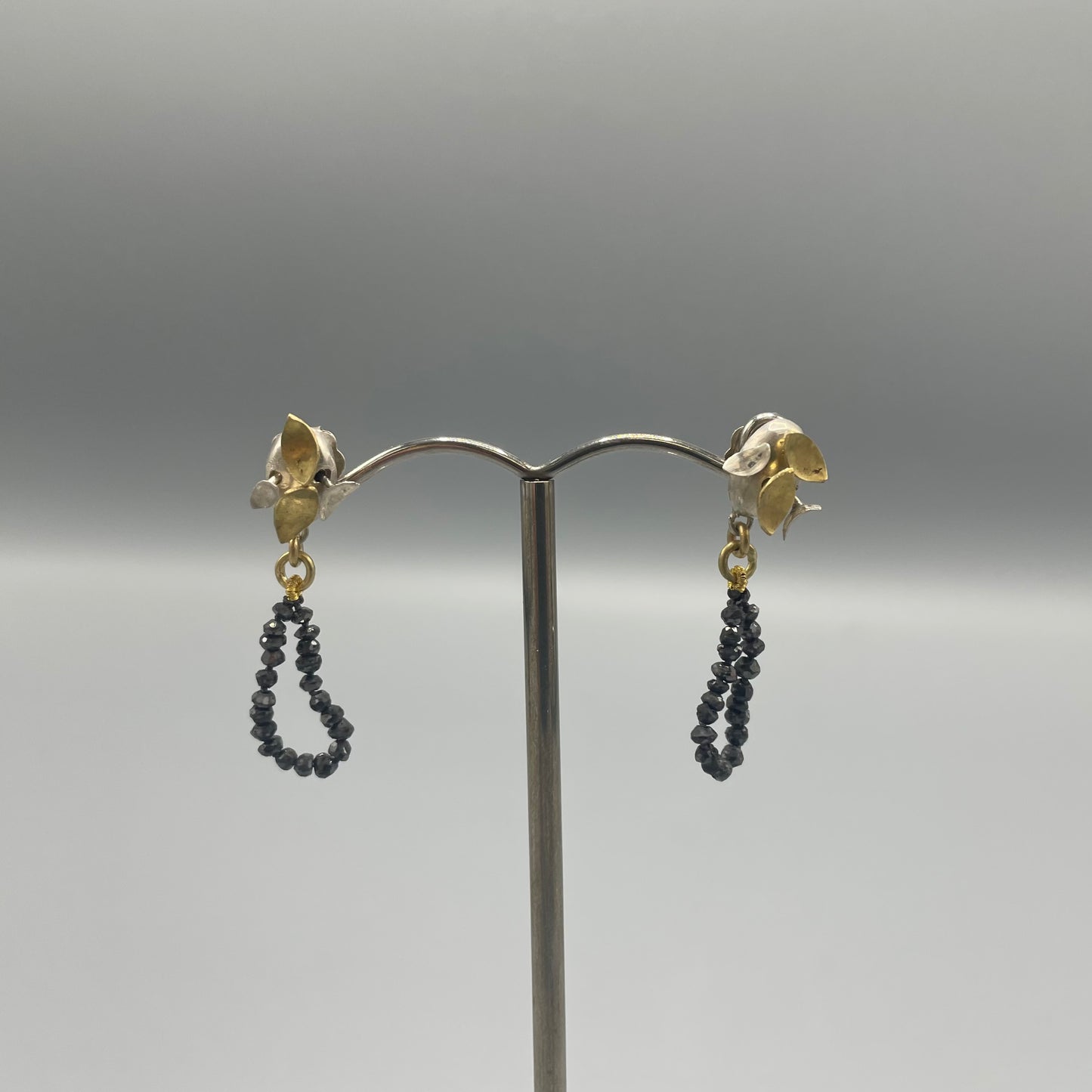 Susi Hines Silver and gold leaves earrings with black diamond beads