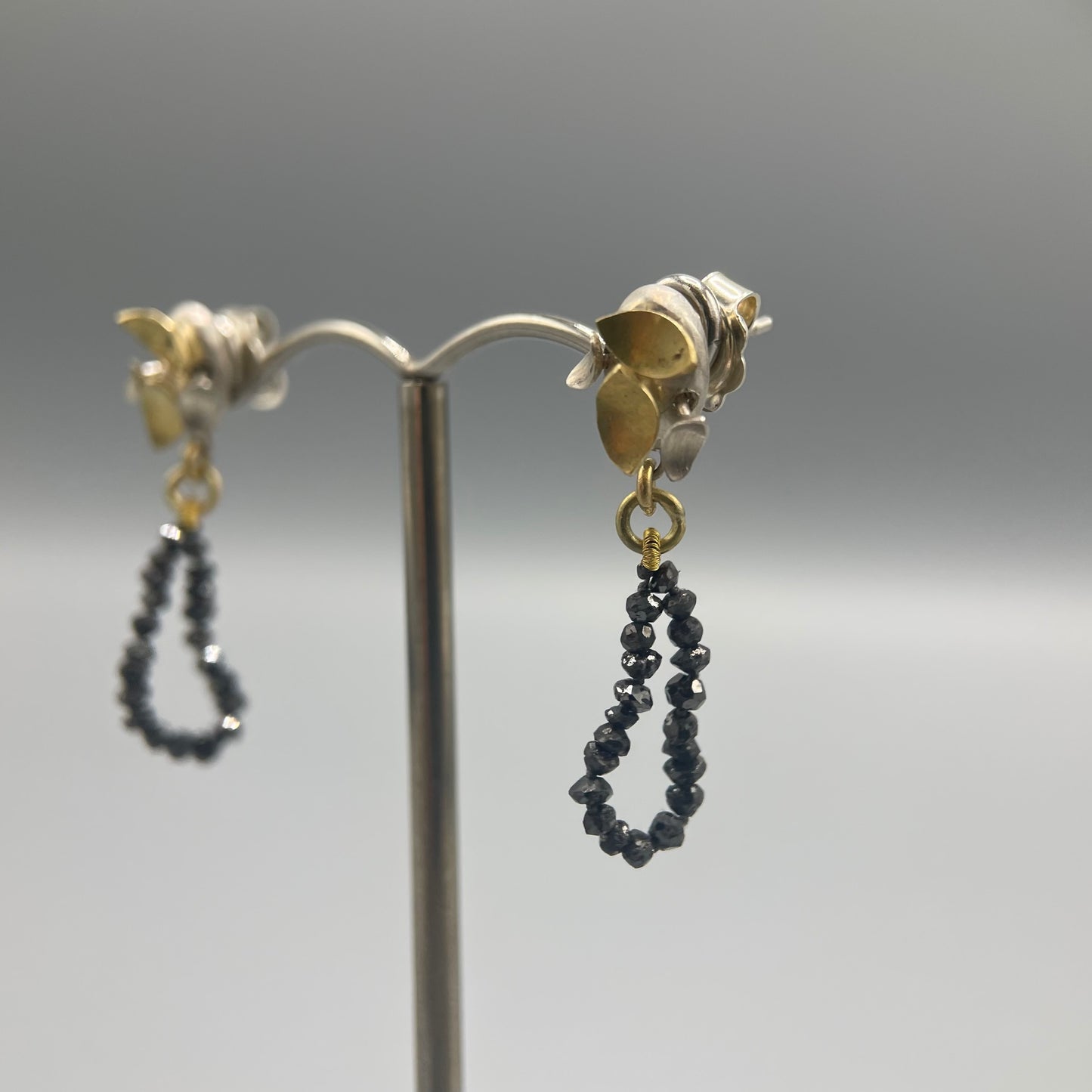 Susi Hines Silver and gold leaves earrings with black diamond beads