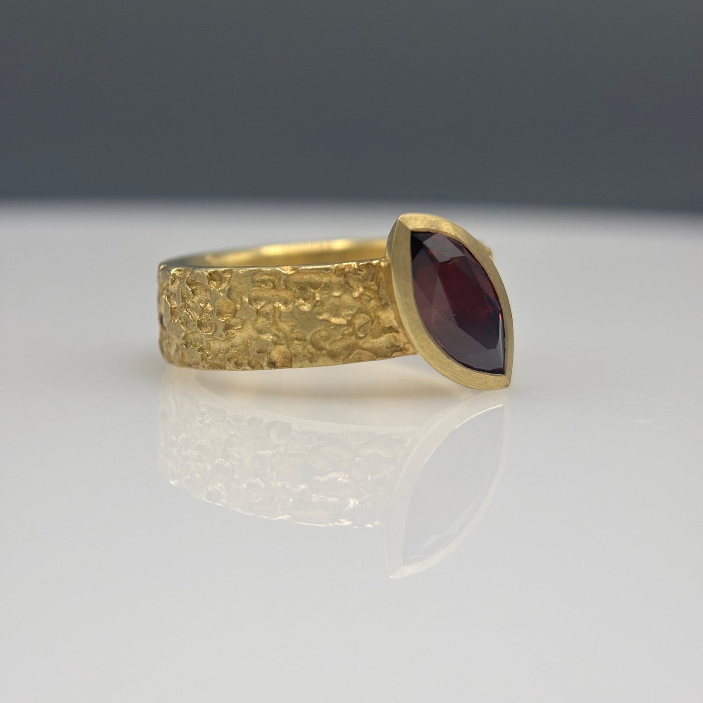Susi Hines – 18ct Gold Plated Etched Silver Ring with Marquis Garnet